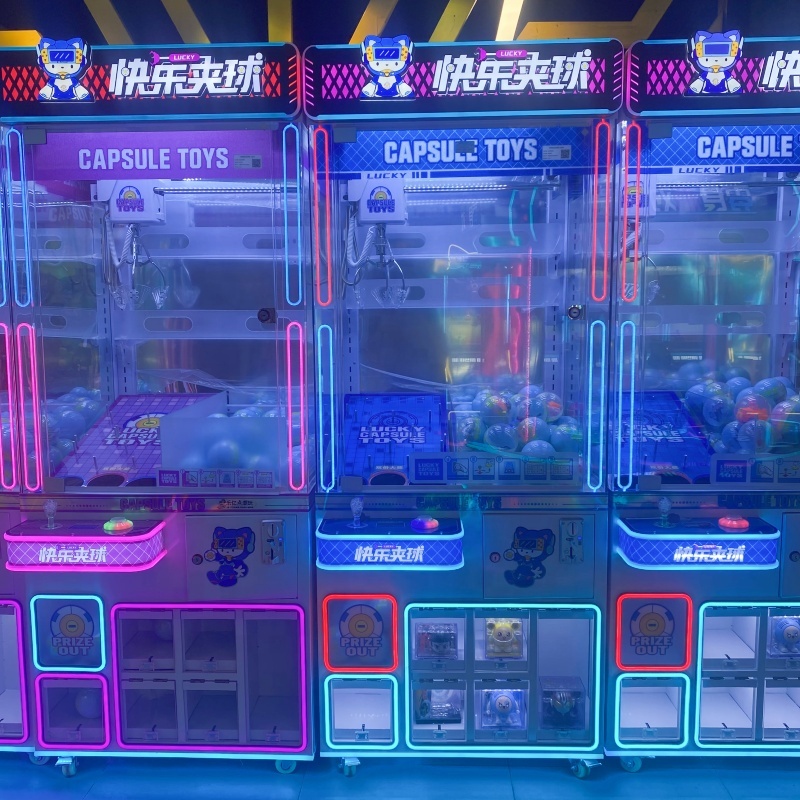 آلة ألعاب الكبسولات والجرافات  - مراجعة Prize Capsule Toy Machine وسعره